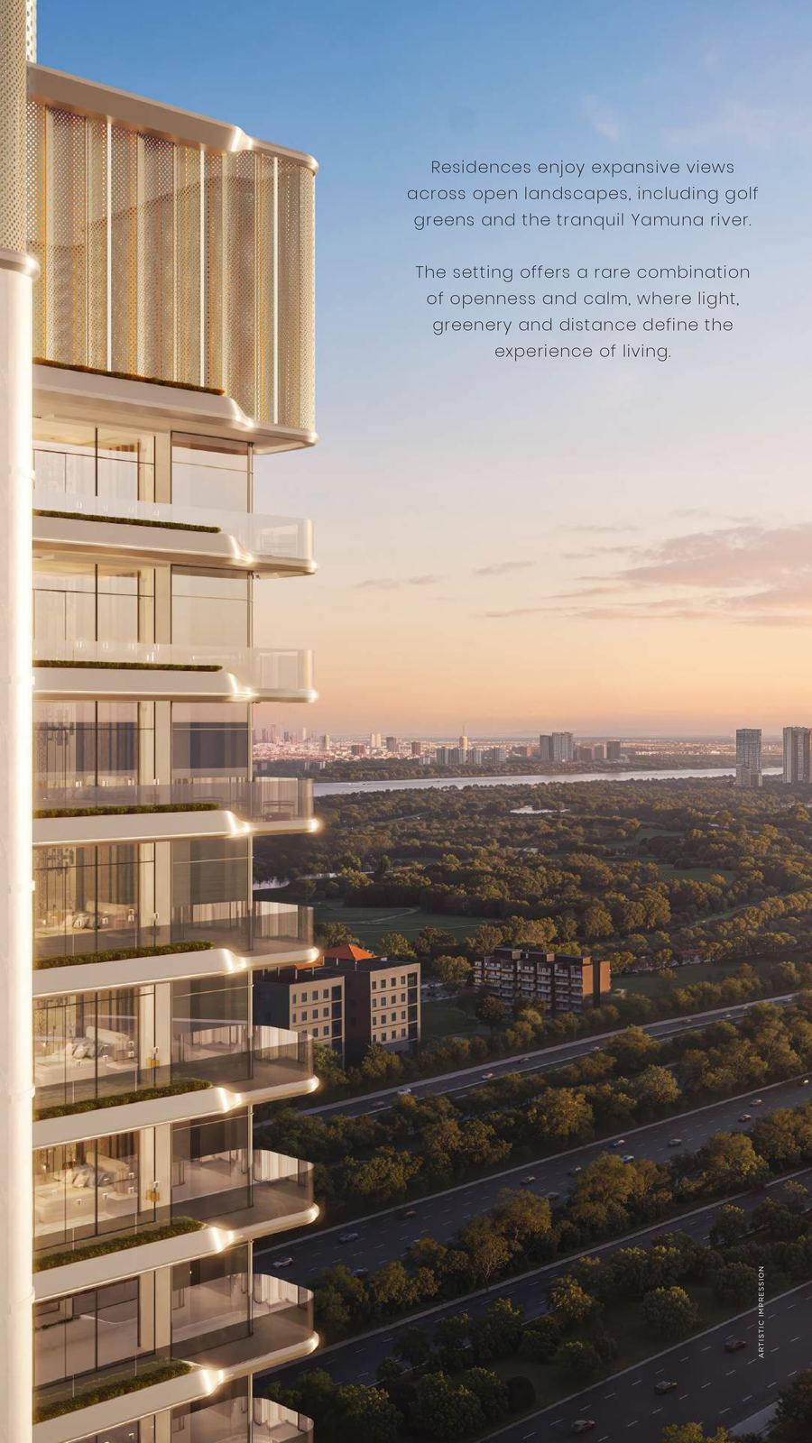 Views across golf greens and the Yamuna river from Smart World Suites